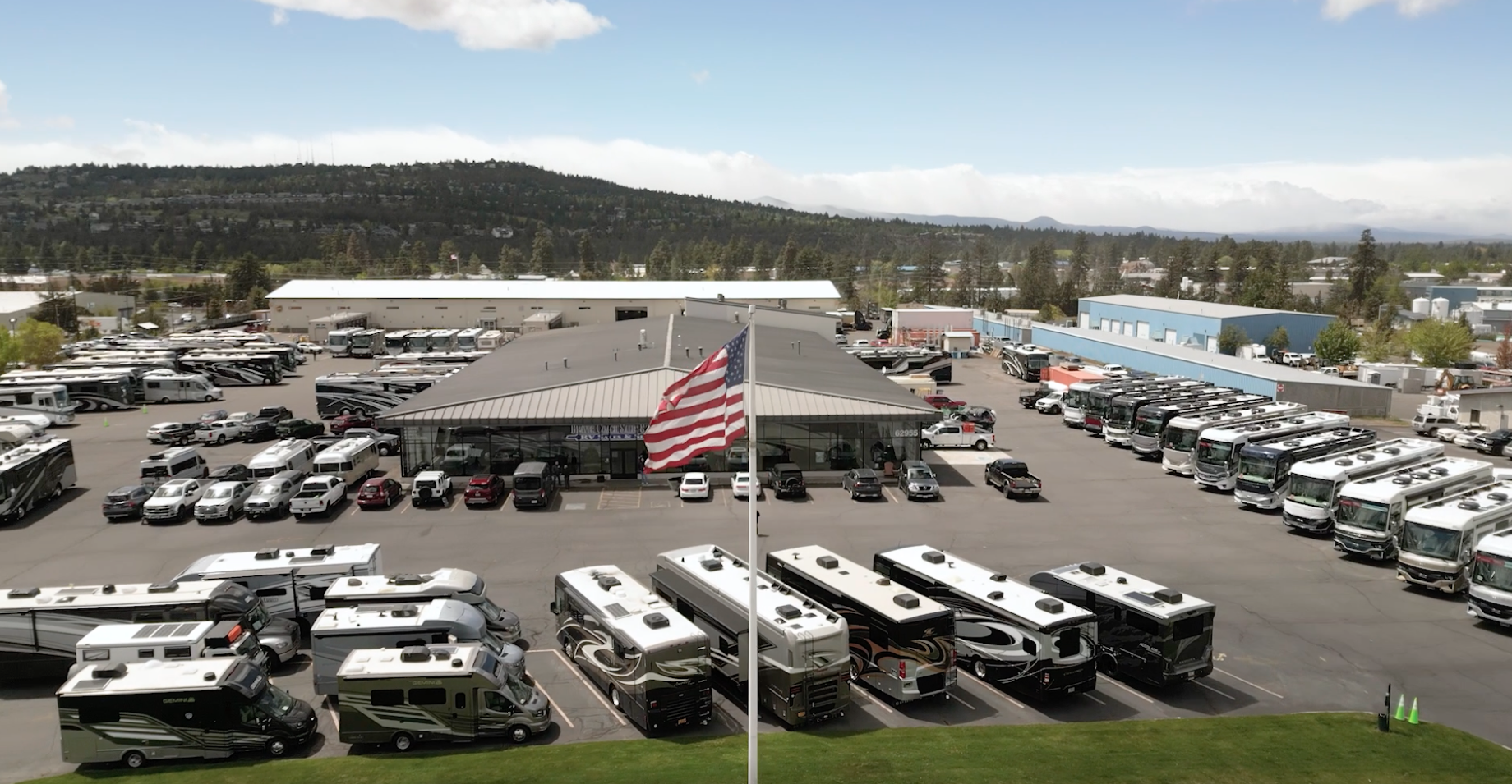 Happy Campers RV rental lot with various motorhomes available for traveling nurses