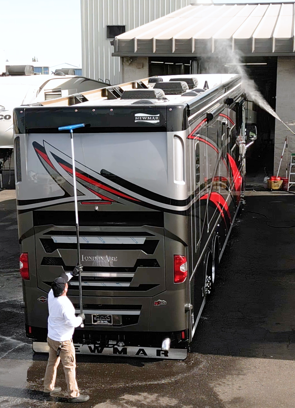 Professional RV maintenance and cleaning service at Happy Campers facility